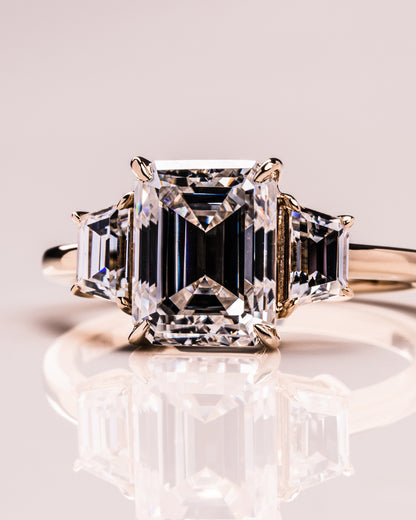 0.66 CT Emerald Cut Three Stone Moissanite Engagement Ring