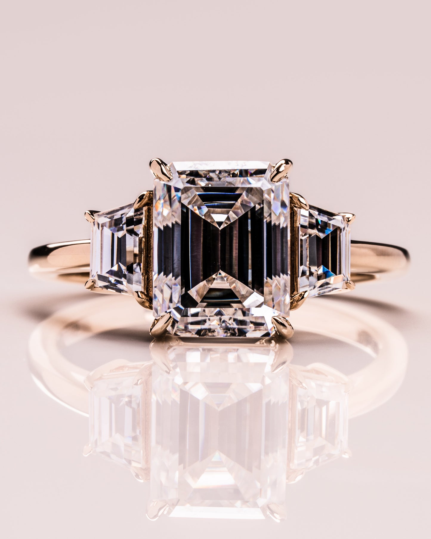 0.66 CT Emerald Cut Three Stone Moissanite Engagement Ring