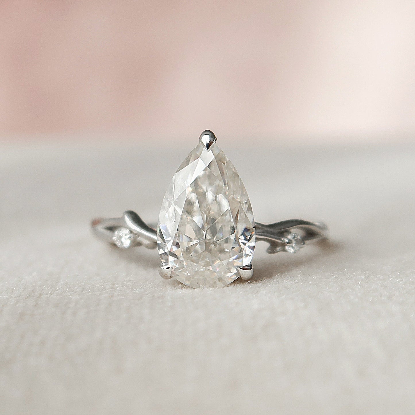 1.5 CT Pear Pave Twisted Moissanite Engagement Ring